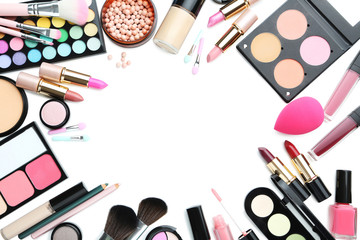 Different makeup cosmetics on white background