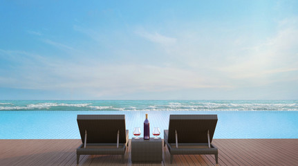 Pool terrace with sea view 3d rendering image,A place surrounded by the sea ,There are wood floor and rattan sunbed