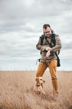 Hiker looking at watch