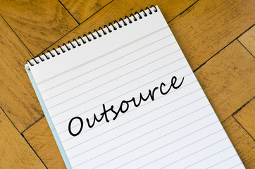 Outsource concept on notebook