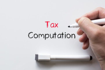 Tax computation written on whiteboard