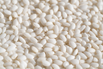 Organic white sticky rice on white background