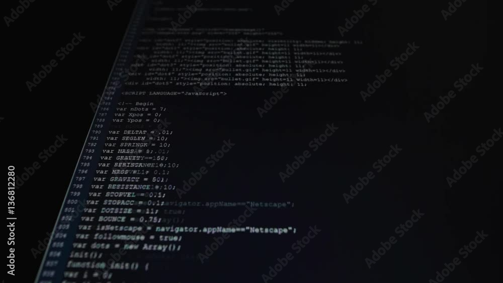 Fototapete The process of writing a computer program on a computer monitor. Text is entered and quickly moved up. A large number of rows of symbols. Work on the software.