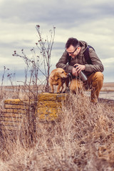 Hiker and dog resting