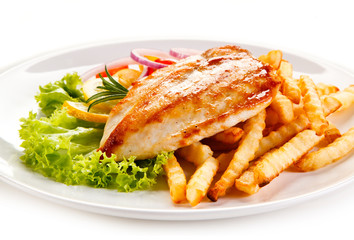 Grilled chicken fillet, chips and vegetable salad 