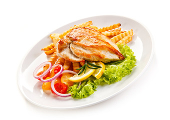 Grilled chicken fillet, chips and vegetable salad 