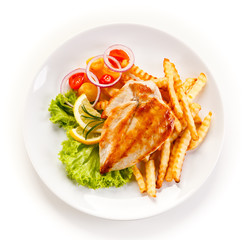 Grilled chicken fillet, chips and vegetable salad 