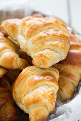 Homemade croissants in a basket