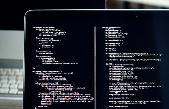 js code on laptop screen, web development