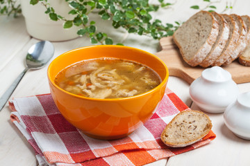 Traditional polish tripe soup with vegetables.