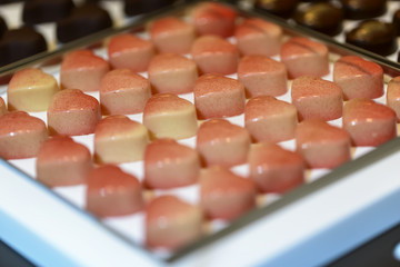 Delicious heart shape chocolates in a showcase 
