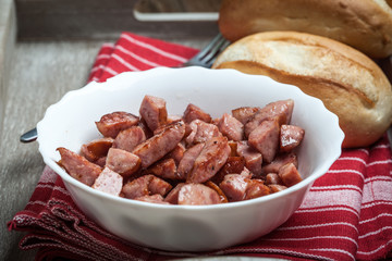 Pieces of sausage fried.