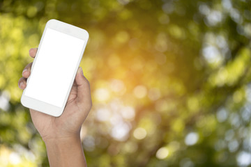 smartphone with abstract nature bokeh blur background.