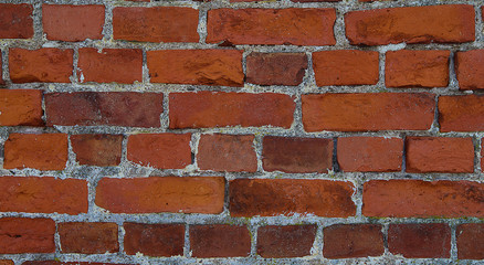Fototapeta premium old masonry of orange rectangular red brick