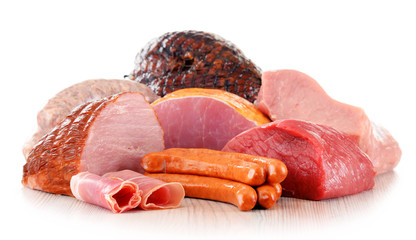 Meat products including ham and sausages isolated on white