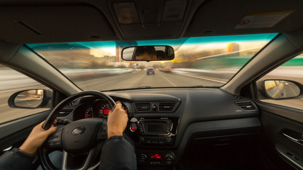 day city road view from inside car