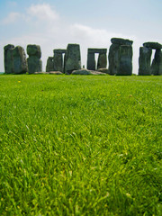 Ancient ruins of Stonehenge in English countryside on a sunny day.