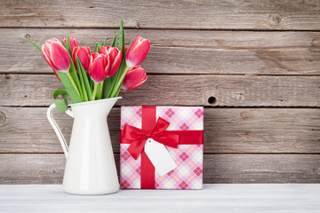 Red tulips and gift box