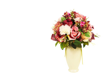 Artificial flowers in the white big vase for interior decoration over white background.