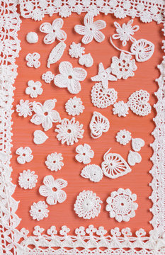 Handmade white crochet frame pattern, knitting, sewing. Homemade backdrop. Mori Girl lace. Creative craft needlework