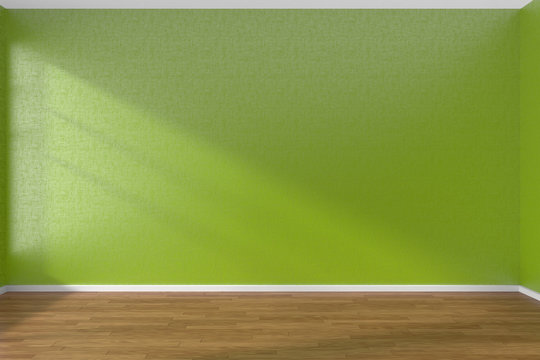 Green empty room with dark parquet floor