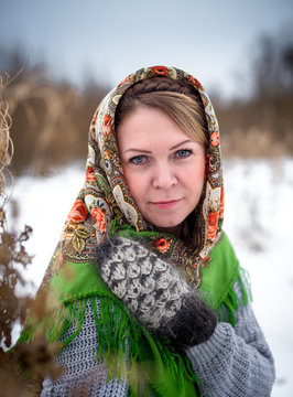 Beautiful Russian woman in a scarf