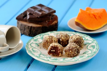Homemade vegetarian truffles with pumpkin, chocolate and coffee