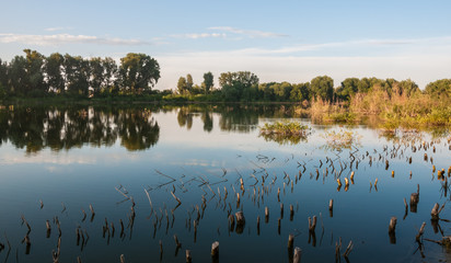 Nature landscape. Wonderful lake in sunset evening time