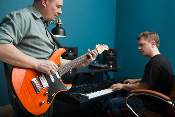 Obraz premium Music rock Band Rehearsal Friendship Together. the baby on a fat