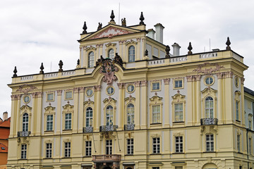Fototapeta na wymiar Classical light yellow municipal building in Prague.