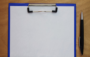 Blank clipboard and pen.