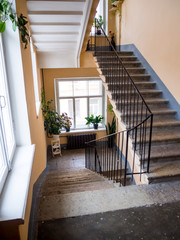 The staircase in the entrance of an old house