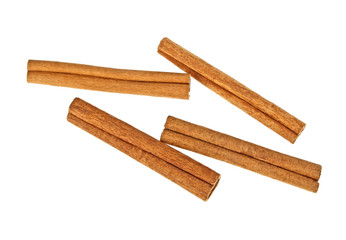 Cinnamon sticks on white background, top view