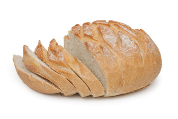 Traditional homemade french round bread with cut off slices isol