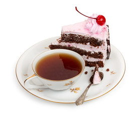 A piece of chocolate cake with cherry cream and canned cherries
