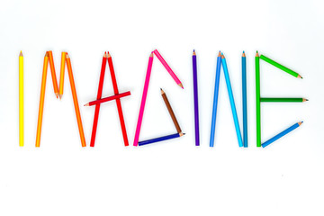 Color pencils as word "IMAGINE".