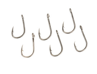 Fishing hooks isolated on white top view close up