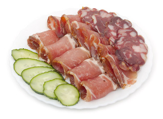 Sliced homemade dry sausages and meat products, cured meat, baco