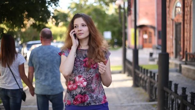 redhead girl turns back