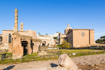 Rome. Italy. The ruins of the Roman Forum: Temple of Saturn, Arch of Septimius Severus, the Curia...