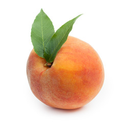Fresh ripe juicy red peach with pair of green leaves isolated on
