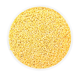 Heap of millet groats in round plate isolated on white. Top view
