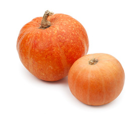 Pair of fresh, ripe yellow pumpkins isolated on a white backgrou