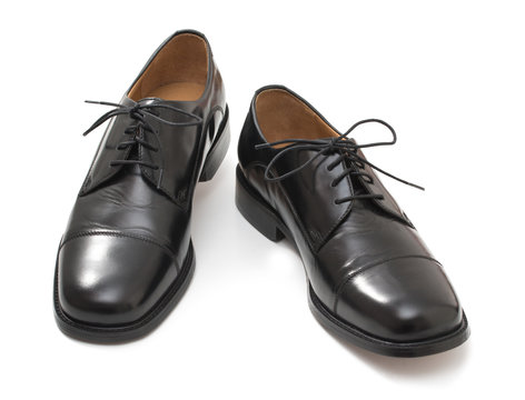 Pair of elegant mens shoes. Fashion black shiny leather. Isolate