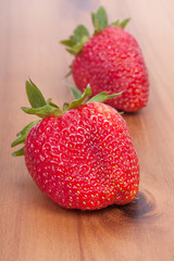 Fresh red berries strawberries on old wooden background. Close-u