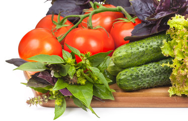 Fresh organic vegetables for cooking food on wooden cutting boar