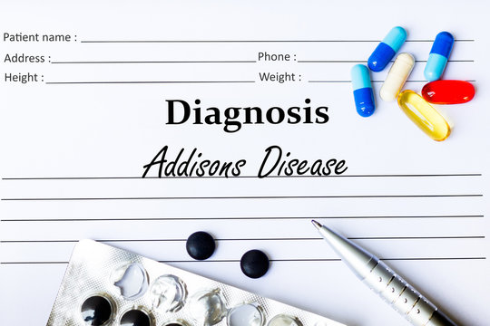 Addisons Disease - Diagnosis Written On A Piece Of White Paper With Medication And Pills