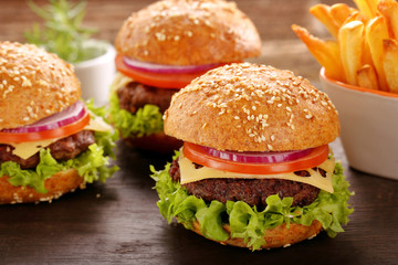 Hamburger with beef meat and fresh vegetables