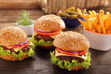 Hamburger with beef meat and fresh vegetables