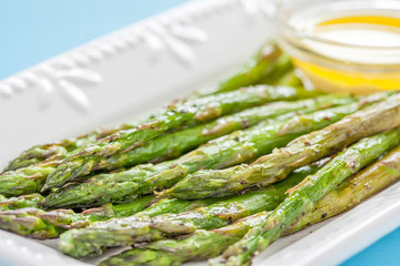 Naklejka premium Roasted Asparagus on a White Plate